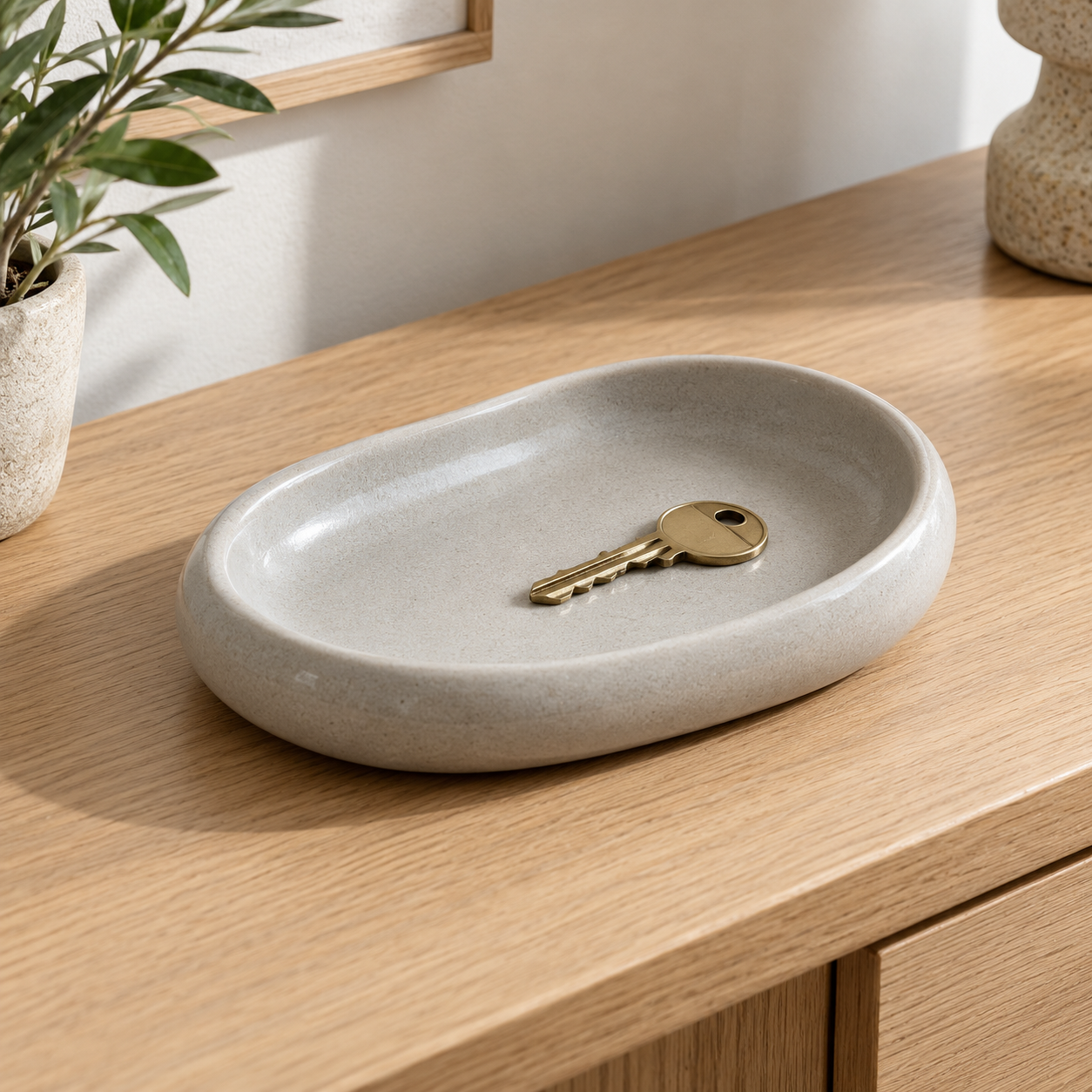 AI-generated fictional test product: Pebble Key Tray.